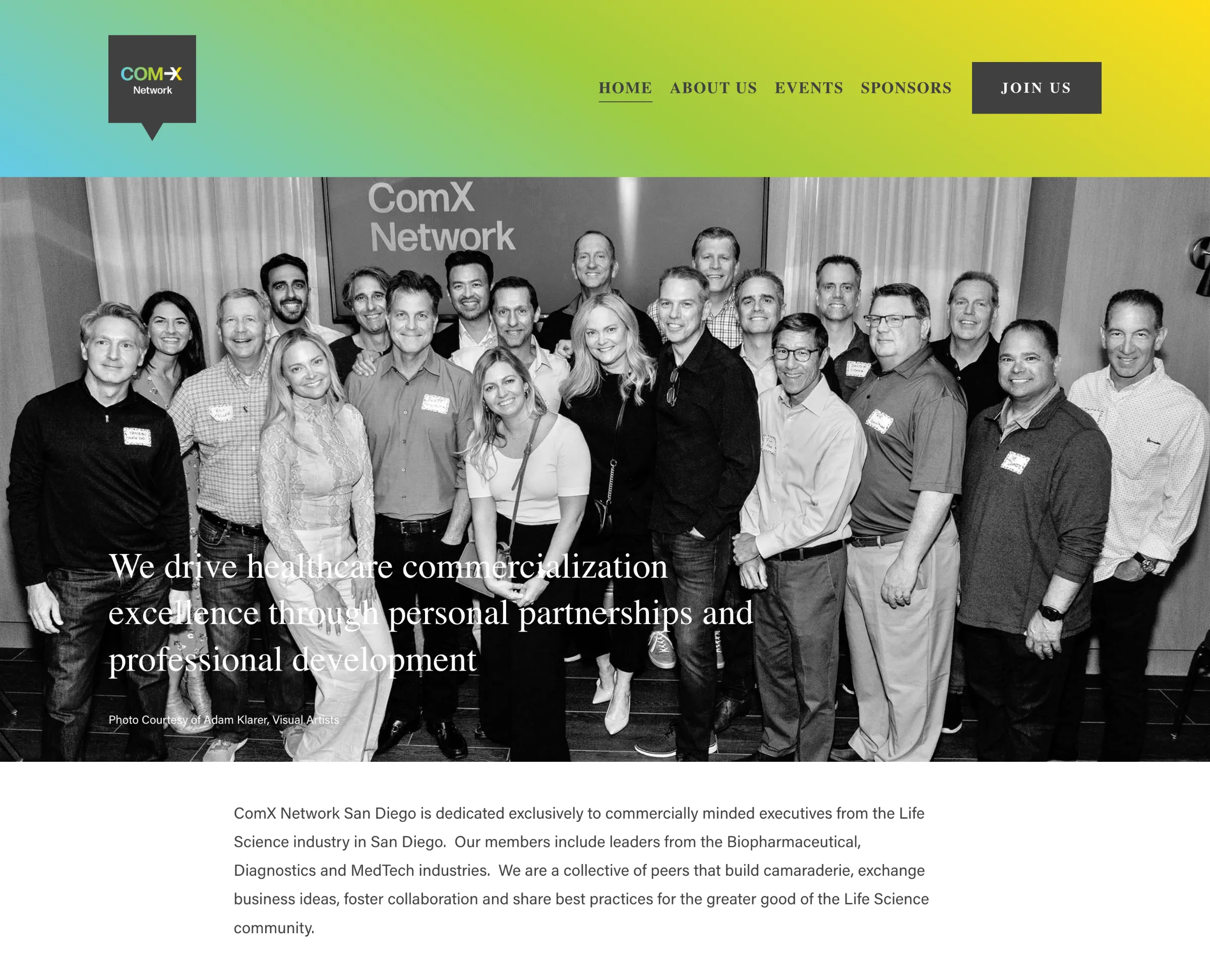 Screenshot of Home Page above the fold, featuring group photo at the networking event for commercially minded executives from the Life Sciences in San Diego.